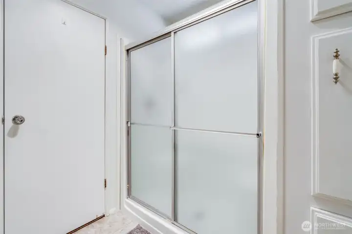 This bathroom has a large shower.