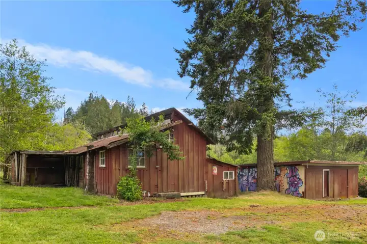 Outbuildings off driveway