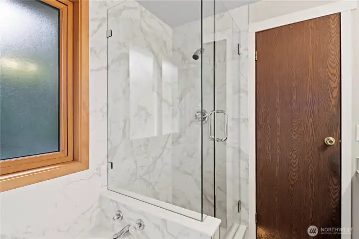 Beautiful new shower and tile surround in primary bathroom