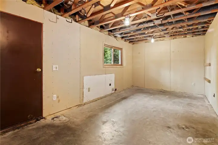 212 square foot unfinished room on lower level - 5th bedroom, playroom, home office, hobby room, additional storage, etc.