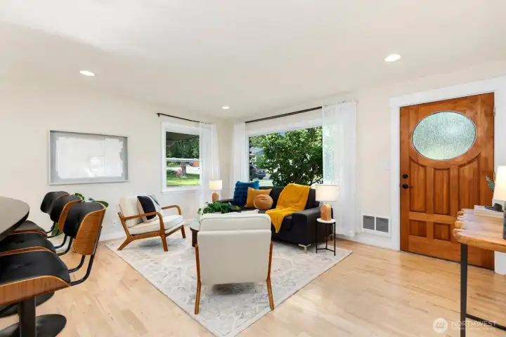 Open layout with the living room flowing to the kitchen.