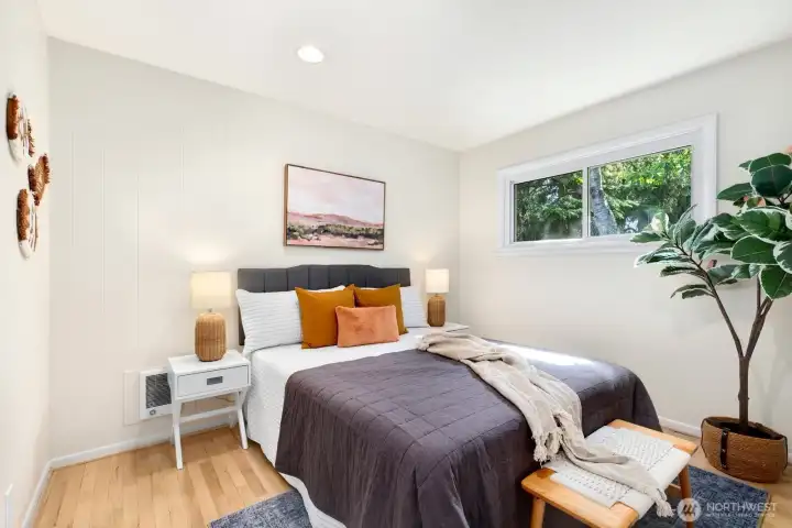 Secondary bedroom enjoys a view of the private backyard.