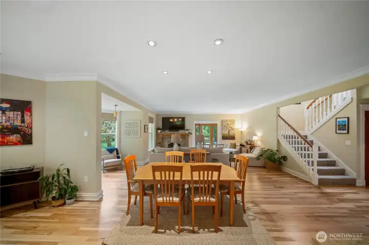 Warm hickory flooring throughout the main floor welcomes you into this beautiful, open floor plan. Generous dining room is open to the living room and kitchen for easy entertaining Warm hickory flooring throughout the main floor welcomes you into this beautiful, open floor plan. Generous dining room is open to the living room and kitchen for easy entertaining