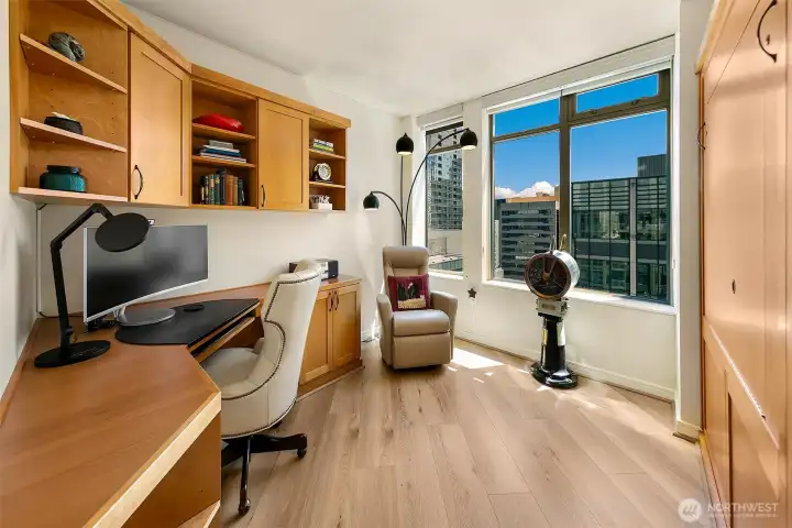 south facing 2nd bed offers built in murphy bed plus over sized table to work from if needed