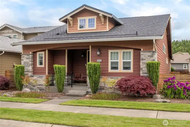 Charming street appeal with extensive stone and a lovely front porch.  Mature landscaping that will only look better in Spring/Summer!  Just steps to the Seven Summits Lodge, Post & Pour, reatil and miles of trails!