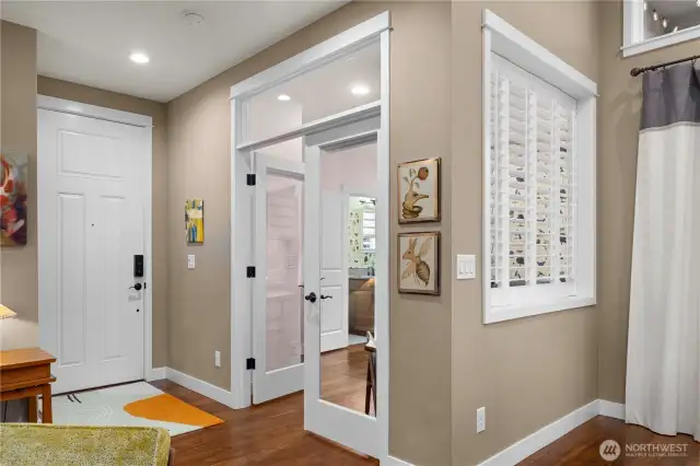 The second bedroom offers much flexibility!  French doors and Plantation shutters so the room can be left open or enclosed.