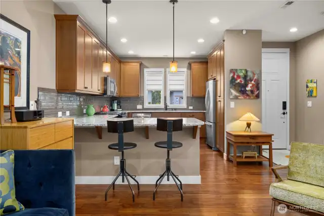 Gorgeous 42" cabinetry, Quart counters and a full height backsplash. Home is the former model home so tons of designer touches throughout.