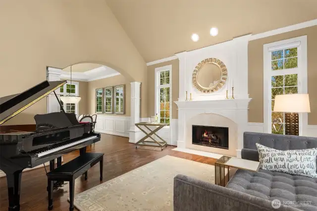 Enter to a grand, light-filled foyer that reveals a signature statement in craftsmanship of this lauded, premier Northwest Builder ~ beautifully detailed crown moldings, coffered ceilings, chair rail, wrapped windows, extensive built-ins and quality trim finishes providing warmth and sophistication.
