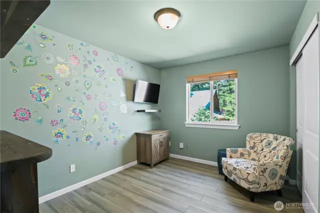 One of the bedrooms that features a space saving murphy bed!