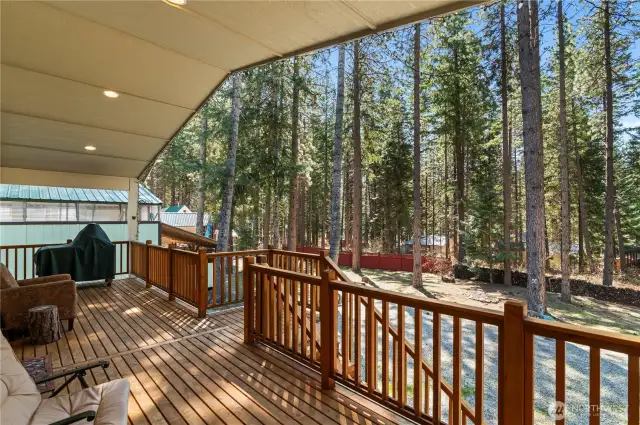 Gorgeous covered back deck overlooking the backyard.
