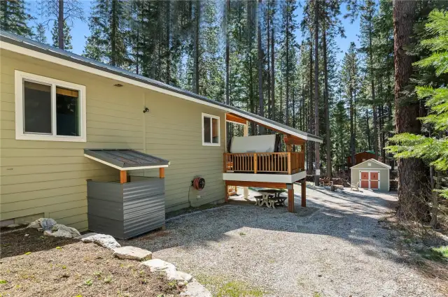 Side view of this low maintenance yard.