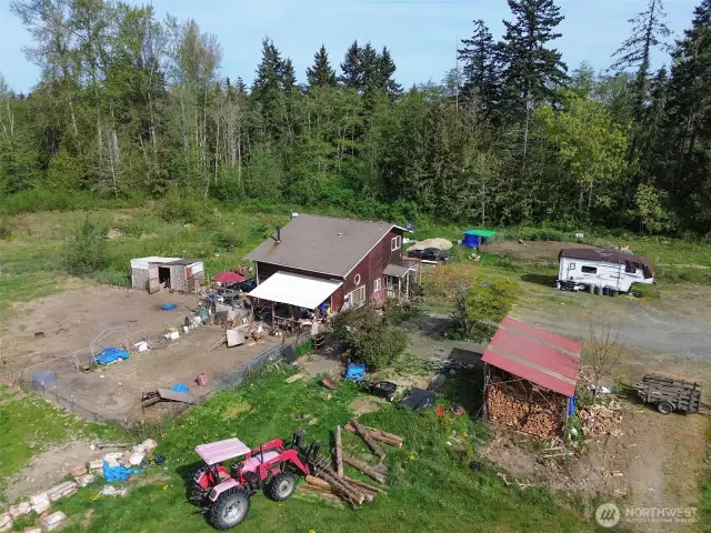 Aerial view, lot goes into tree line.