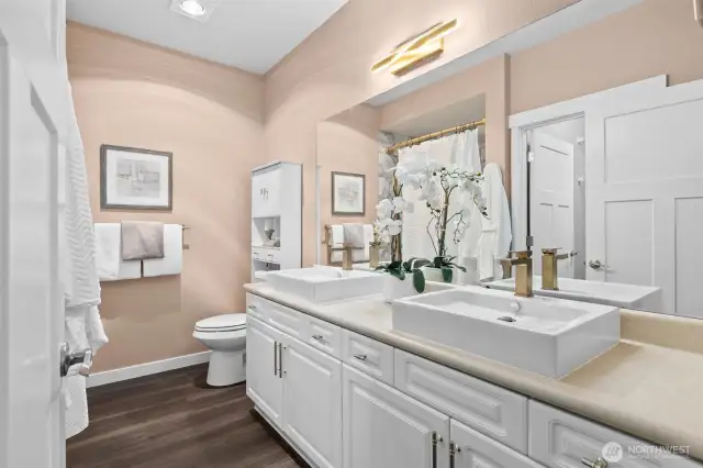 En Suite Features New Curved Tub & Tile, Dual Vanity, and Lights