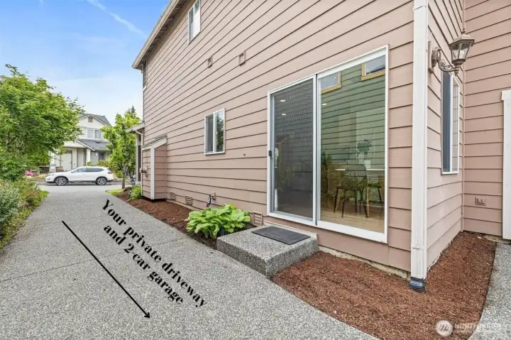 Private driveway and 2-car garage