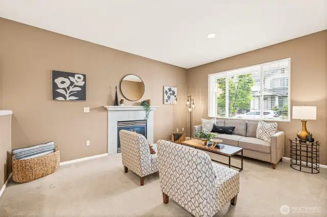 Cozy gas fireplace with an open floor plan feel.