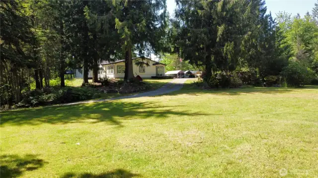 Secluded home on 5 park like acres