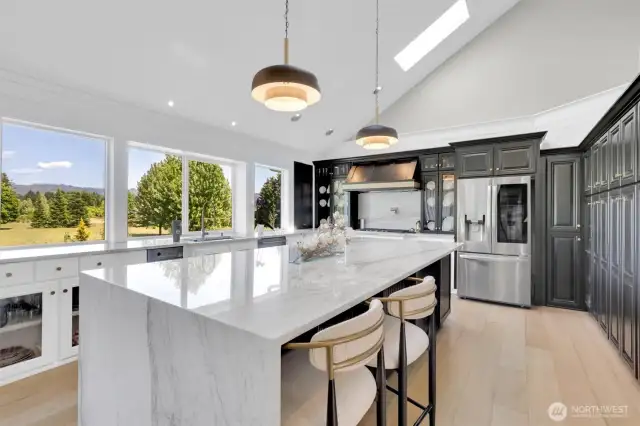updated kitchen with quality waterfall quartzite