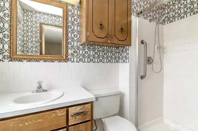 Primary bathroom with step-in shower.