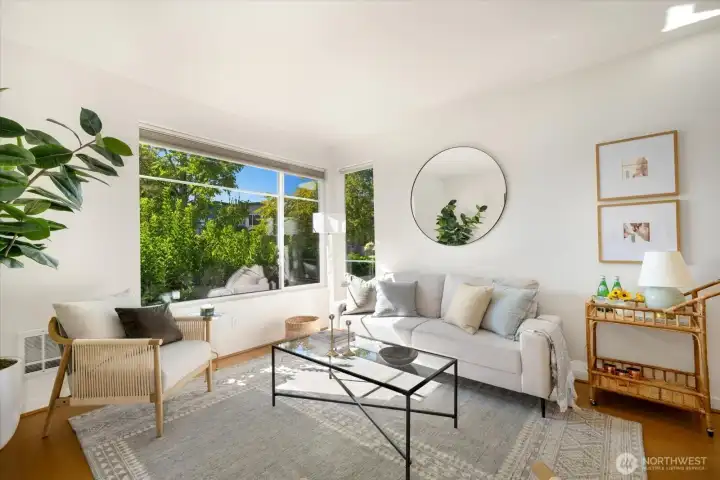 As you enter, gorgeous, engineered hardwoods greet you. Large-scale windows bring the sunlight, in.