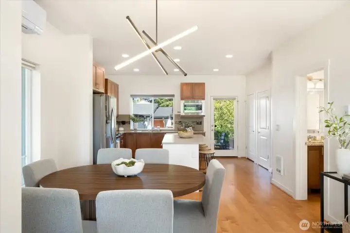 Brand new carpet installed throughout home, and impeccably maintained engineered hardwoods.