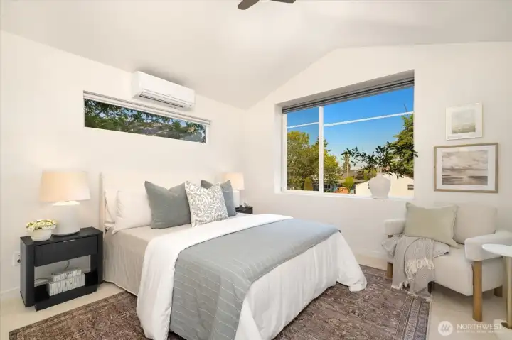Large Primary suite with vaulted ceilings, AC and territorial views. Brand new carpet throughout the upstairs and steps!