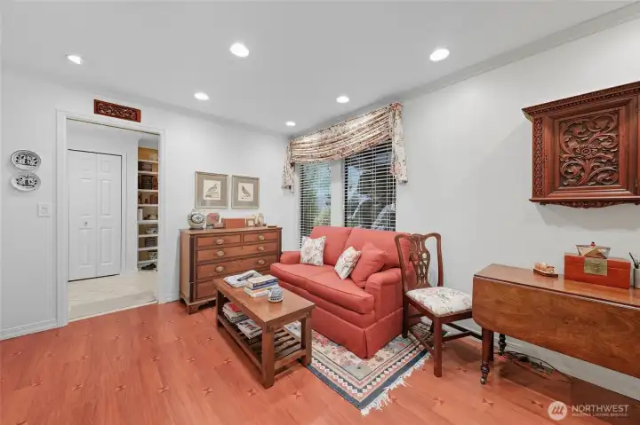 Cozy family/TV room off the entry & adjacent to kitchen.
