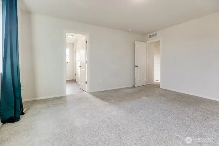 Primary bedroom with bath