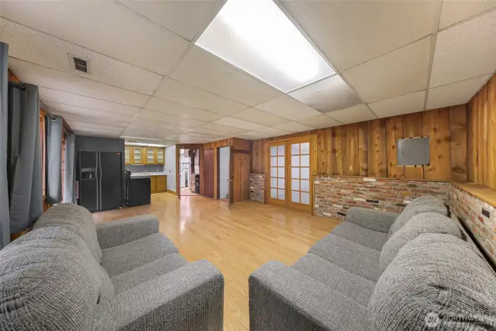 ADU is in lower level and includes stove, fridge, sink and kitchen cupboards