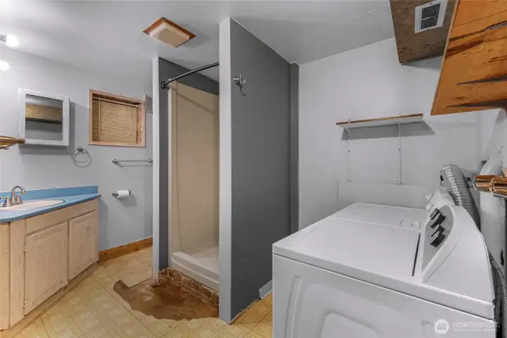 ADU bathroom with washer and dryer!