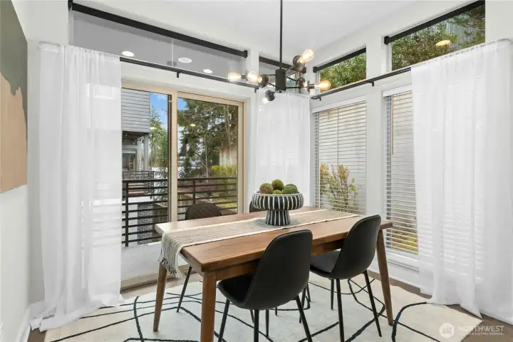 Dedicated dining area with 2nd balcony and floor to ceiling windows and new chandelier!