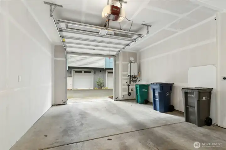 Tandem 2 car garage with EV charging!