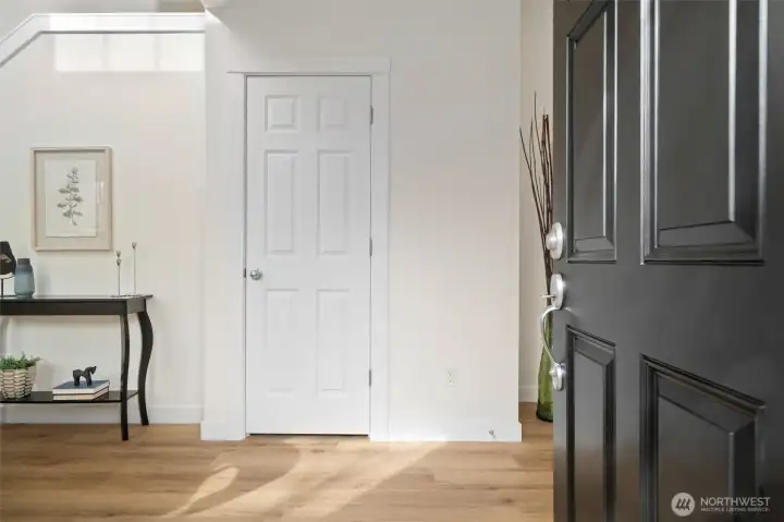 Entry Hall with soaring ceilings, brand new flooring & fresh paint await you!