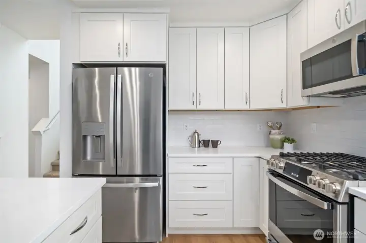Quality refrigerator - brand new gas range, all new counters, floors and cabinets.