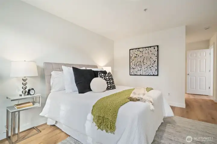 Primary bedroom on main level - easy access to dining, laundry, kitchen and living room.