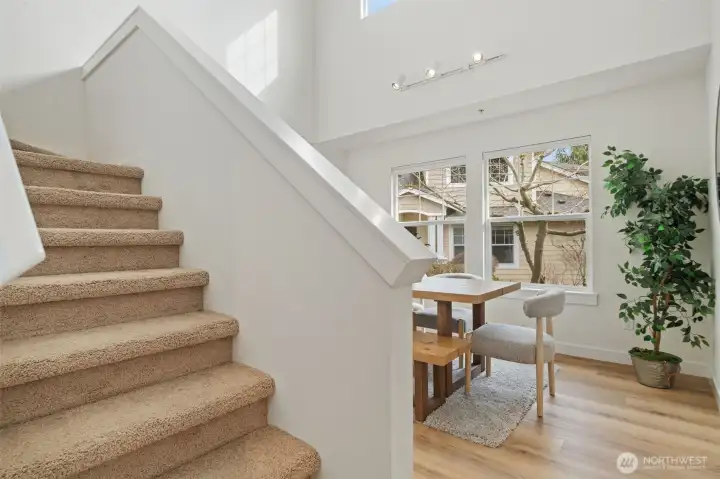 Freshly carpeted stairs lead you up to the loft, full hall bathroom & 2 bedrooms.