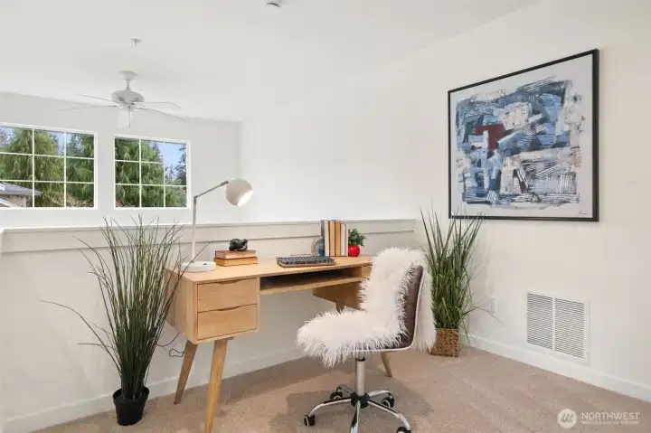 Upstairs hall loft, great for a little office set-up with clear story windows and loads of natural light.