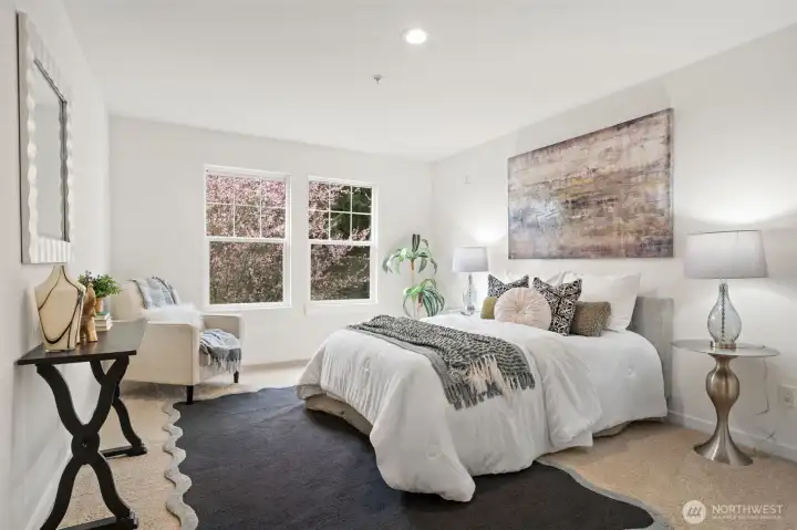 Upstairs bedroom with fresh paint, carpets & nice outlooks.