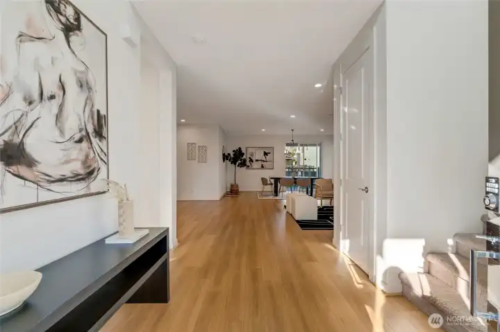 Luminous entry w soaring ceilings