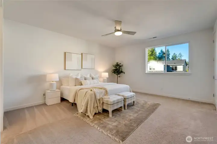 Primary suite with double closets (staging has been removed)