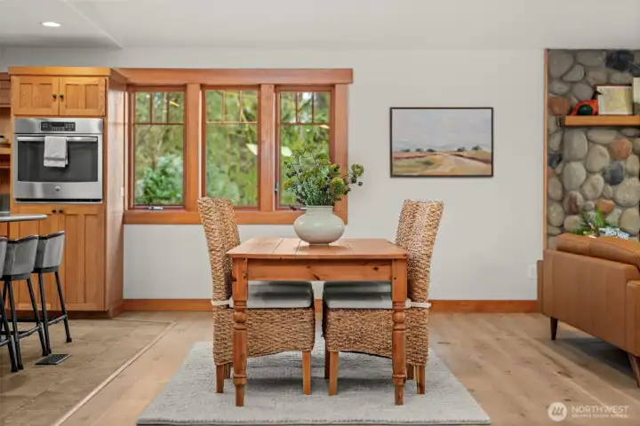 Dining area overlooking trees and natural landscape
