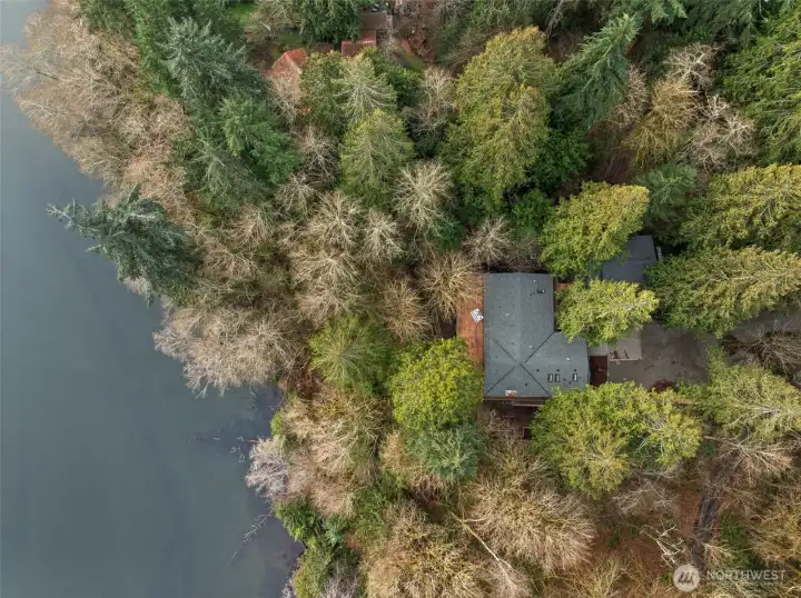 Aerial view of Minter Bay waterfront setting with natural privacy