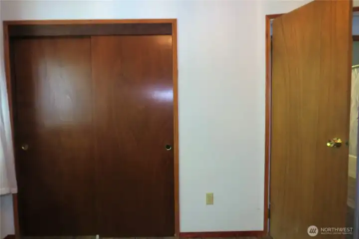 Guest room has a large storage closet and is across the hallway from the bathroom!