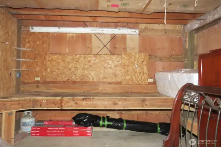 Inside the garage is a completely enclosed large shop!