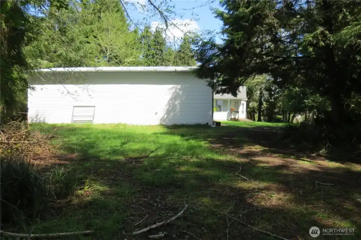 View of the property to the garage and home from the property line!
