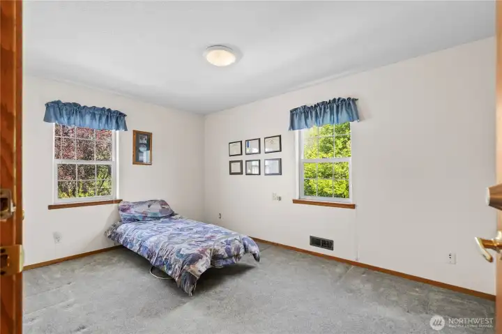 One of four upstairs bedrooms.
