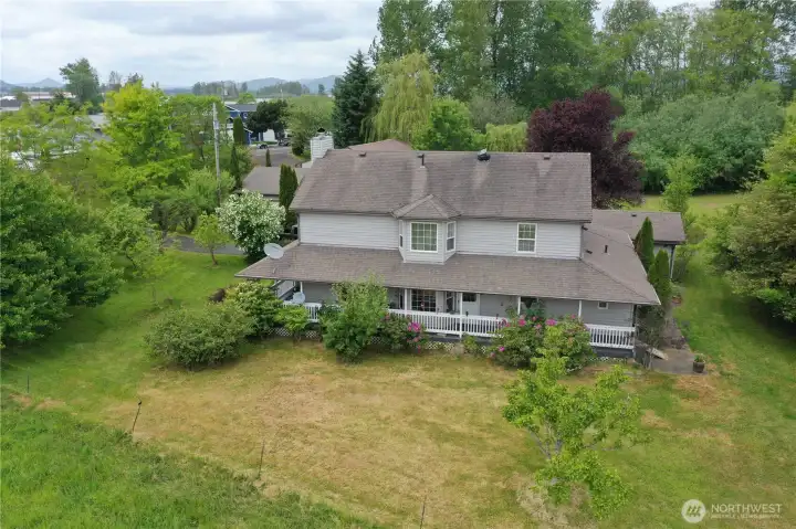East side of home. Apple trees throughout property of many varieties.