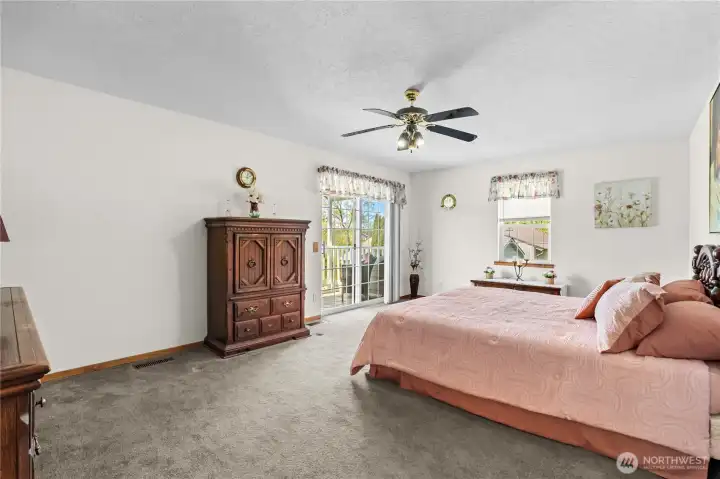 Master with deck, walk in closet, private bathroom with separate shower and soaking tub.