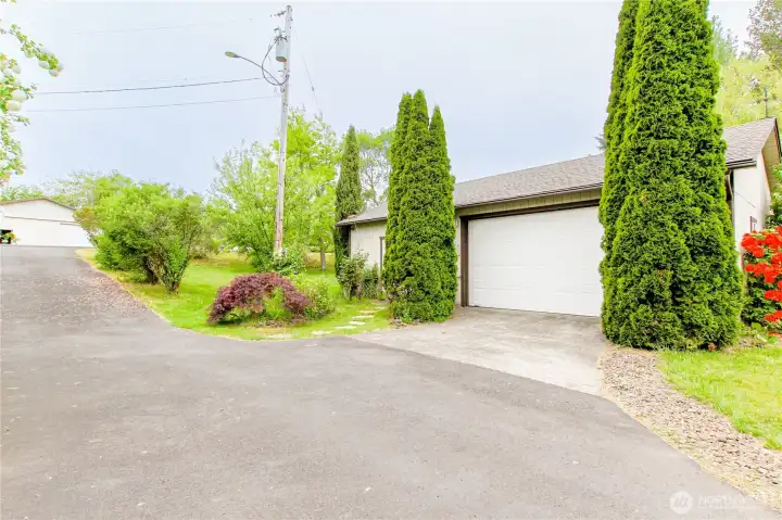 26x38 detached garage with shop space on side.