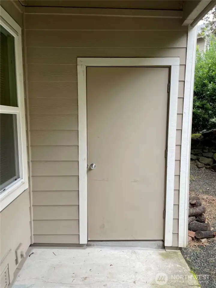 Patio with large storage closet
