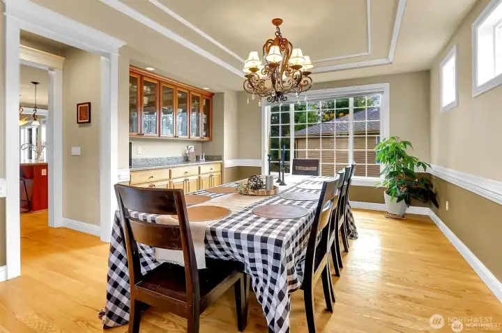 Formal dining room with built in buffet and cabinets.